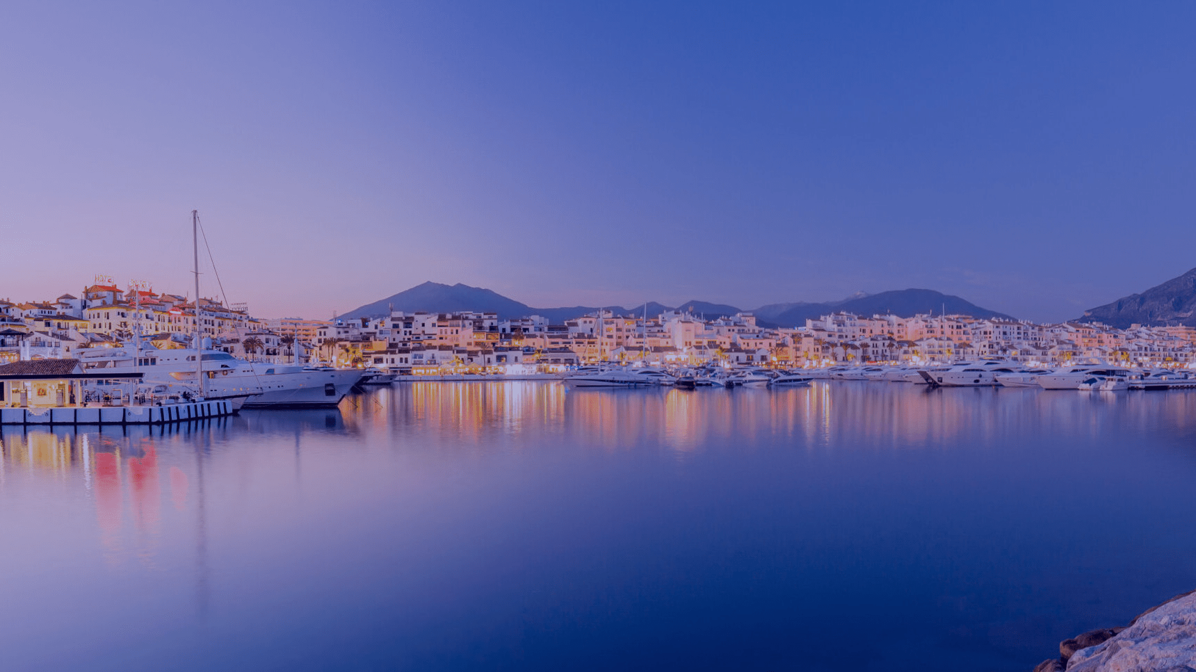 Puerto Banús marina at dusk, where dolphin-watching boats depart